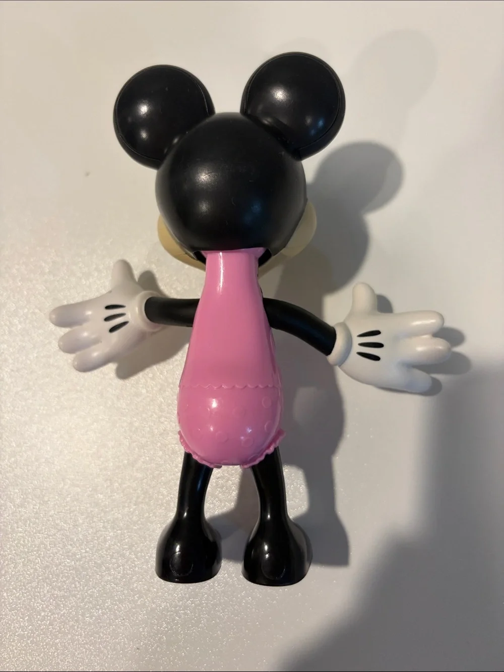 Minnie Mouse with push button arms and head figurine